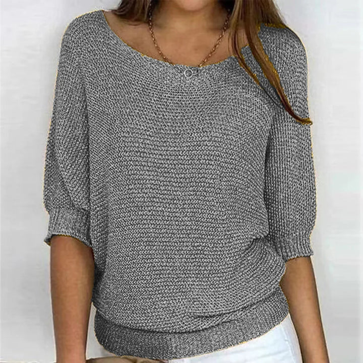 Heather gray knit top with scoop neckline and three-quarter batwing sleeves