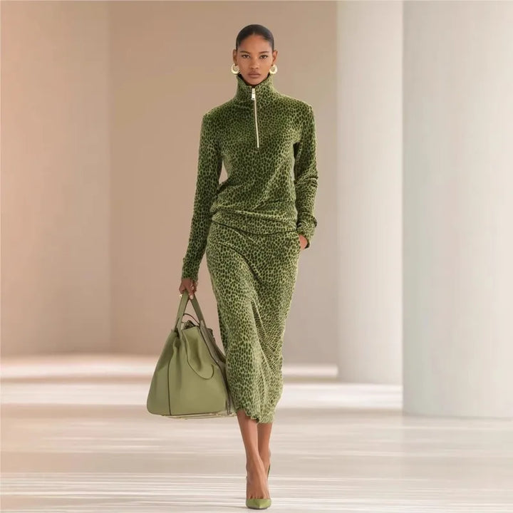 Woman in green leopard print half-zip top and midi skirt set