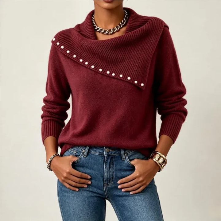 Woman wearing burgundy scarf collar sweater with pearl stud trim
