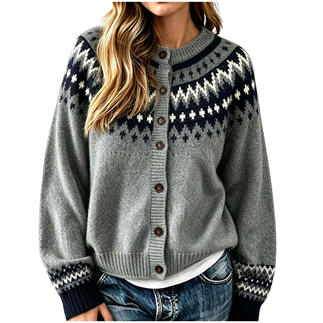 Close up of grey and navy fair isle cardigan with button front