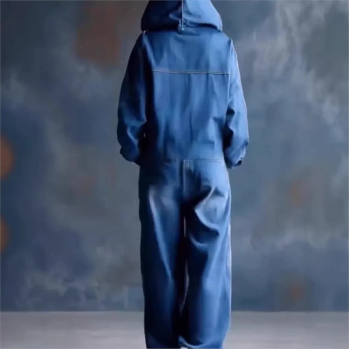 Back view of light blue hooded denim jumpsuit