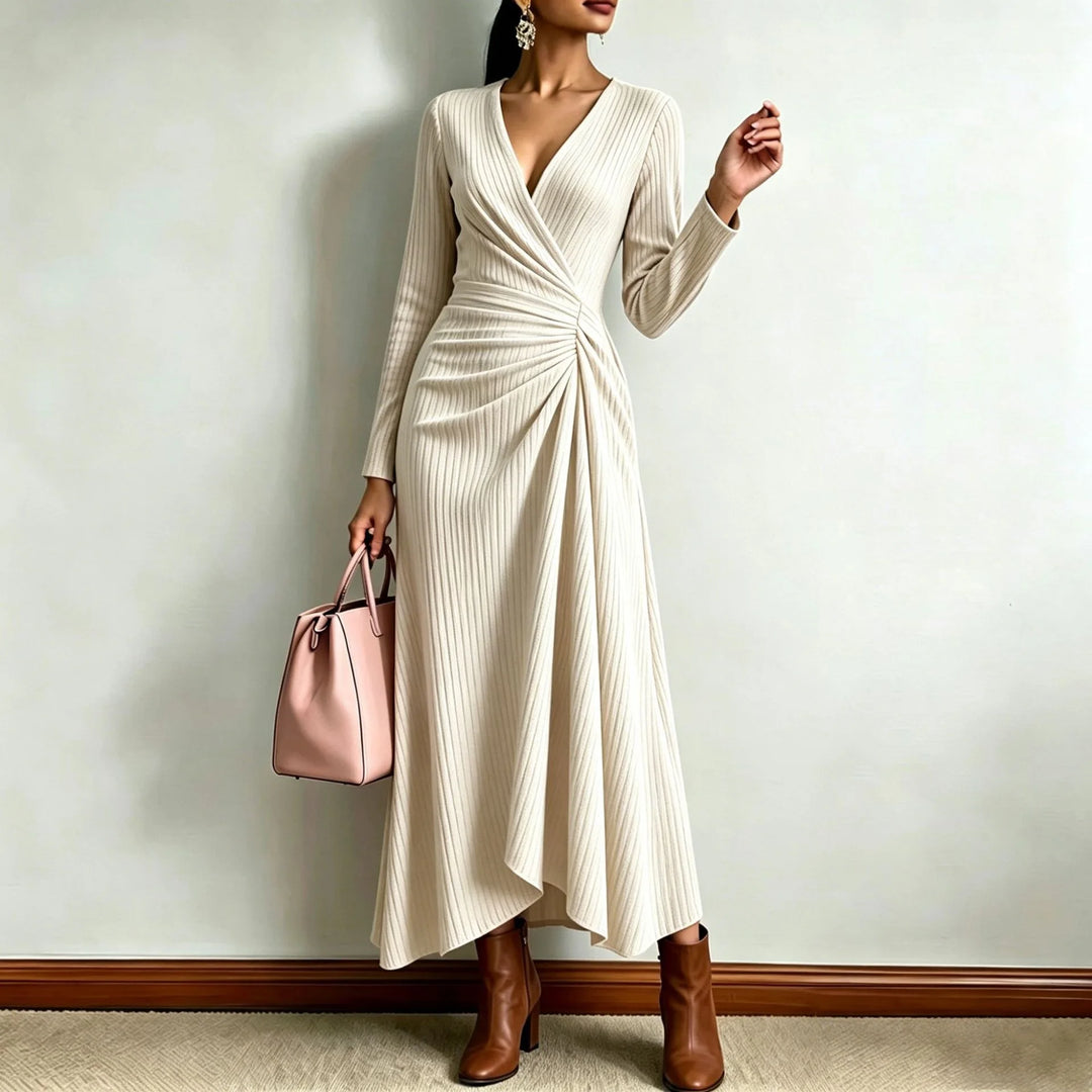 Apricot ribbed knit wrap dress, close up front view with handbag
