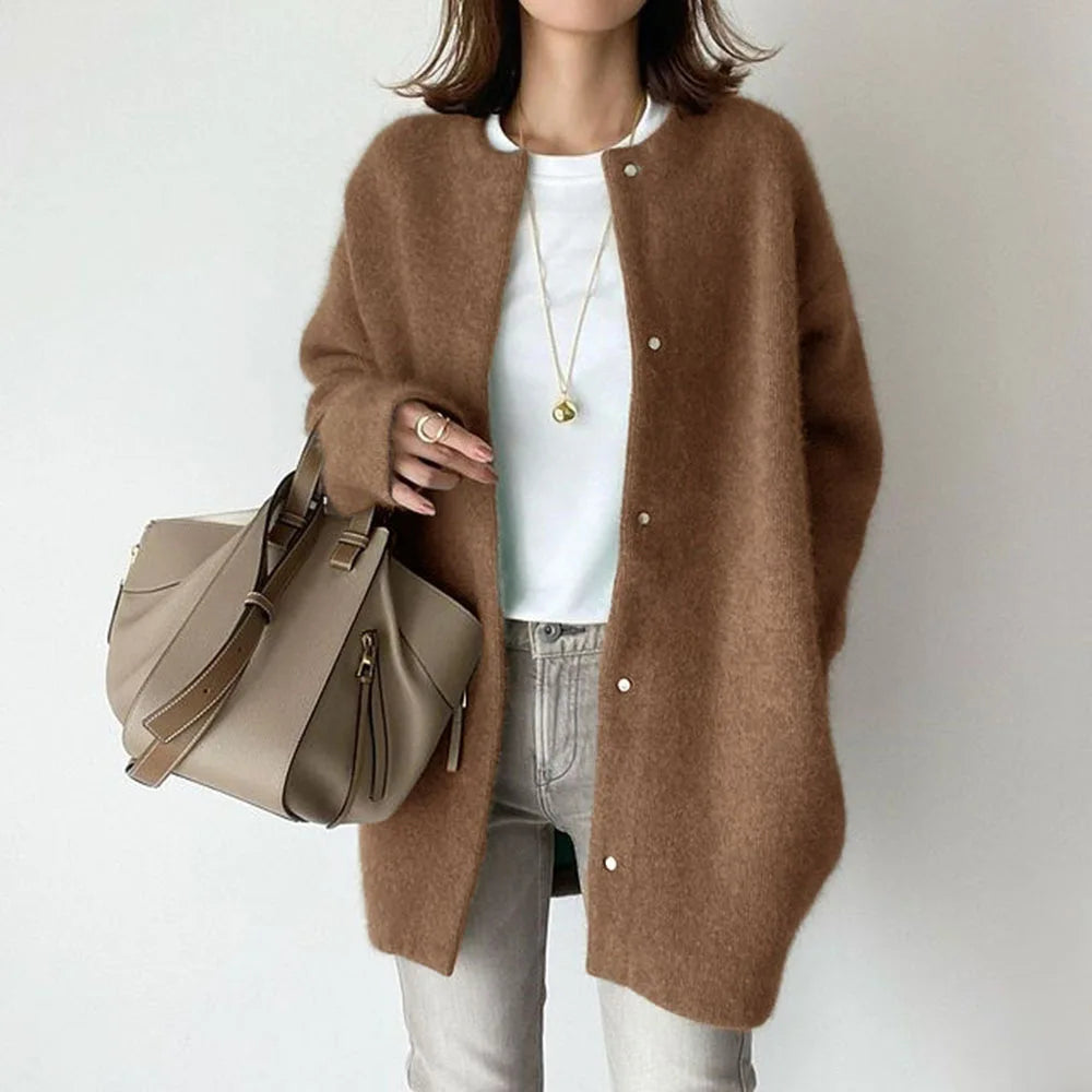Caramel colored oversized knit cardigan close up