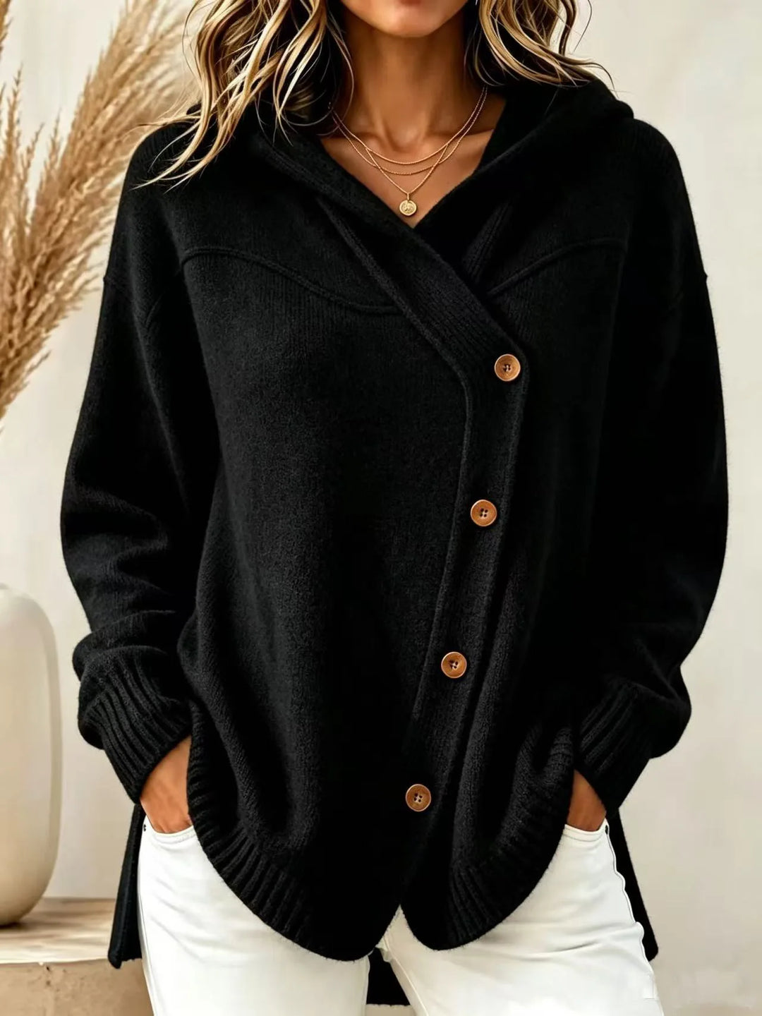 Black hooded knit cardigan with asymmetric button front