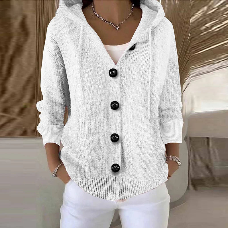 Woman wearing white hooded button-front cardigan sweater