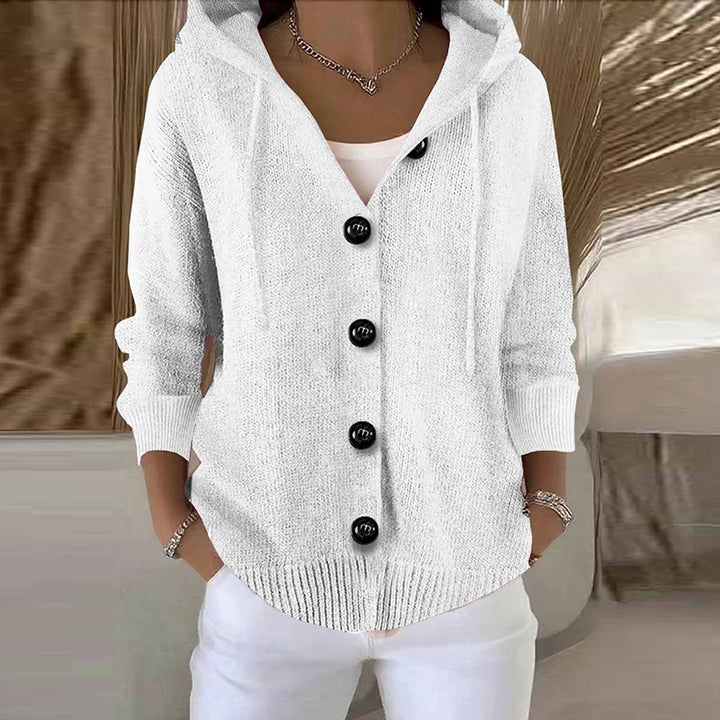 Woman wearing white hooded button-front cardigan sweater