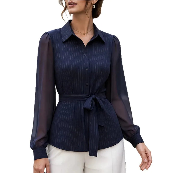 Navy pinstripe belted blouse on white background