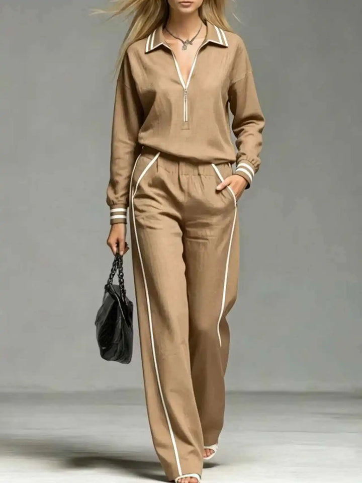 Woman wearing khaki half-zip two piece pant set close up