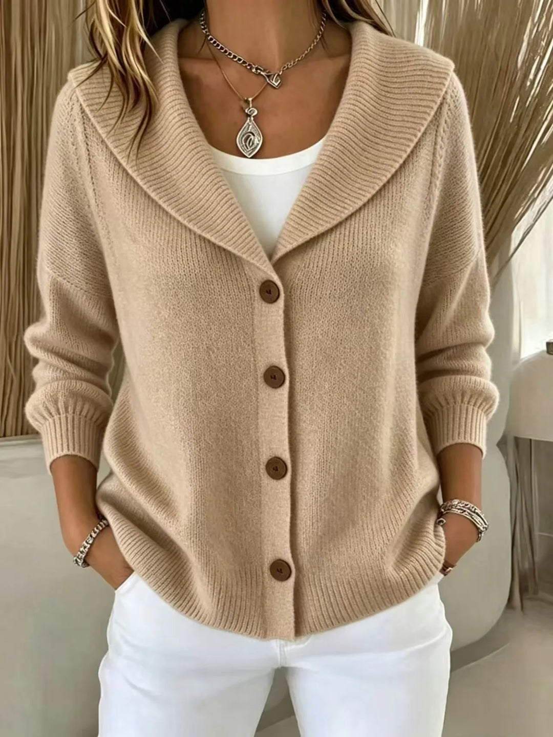 Woman wearing khaki shawl collar button front cardigan