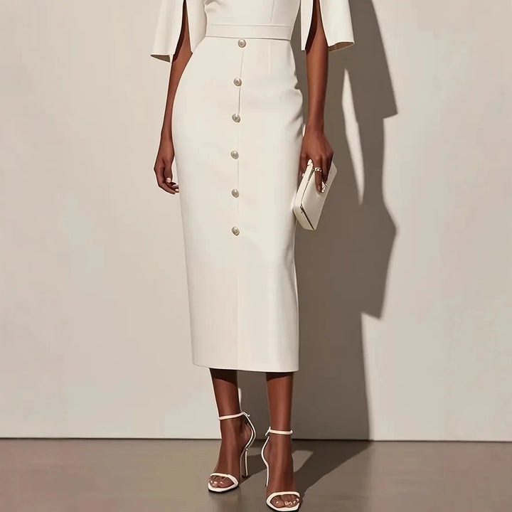 Close up of white pencil dress skirt with button front detail