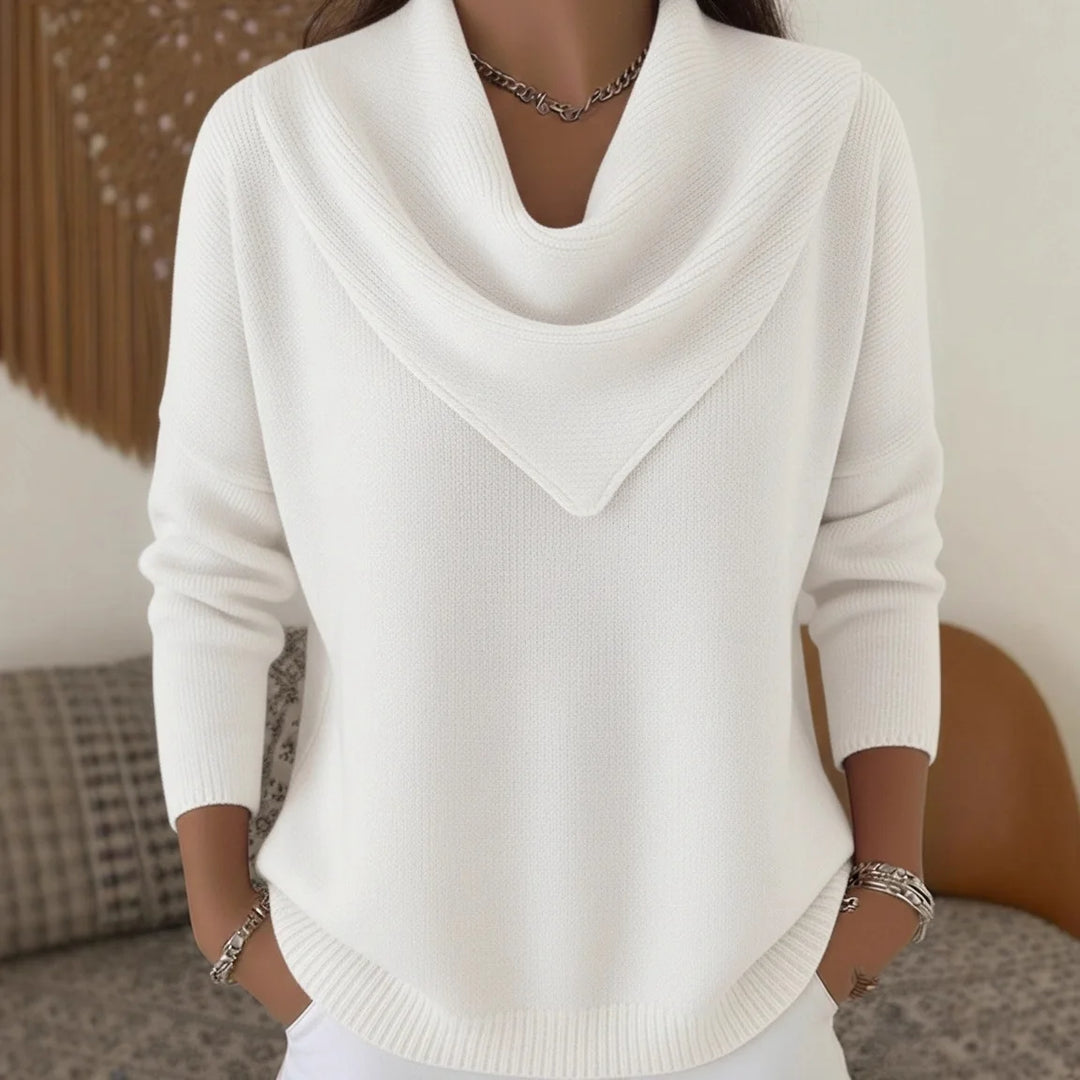 Woman wearing white cowl neck ribbed knit sweater