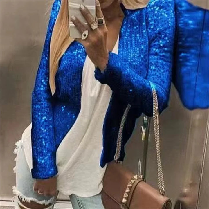 Close up of blue sequin jacket sleeve detail