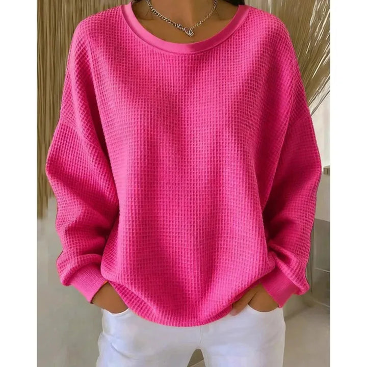 Woman wearing pink waffle knit oversized top