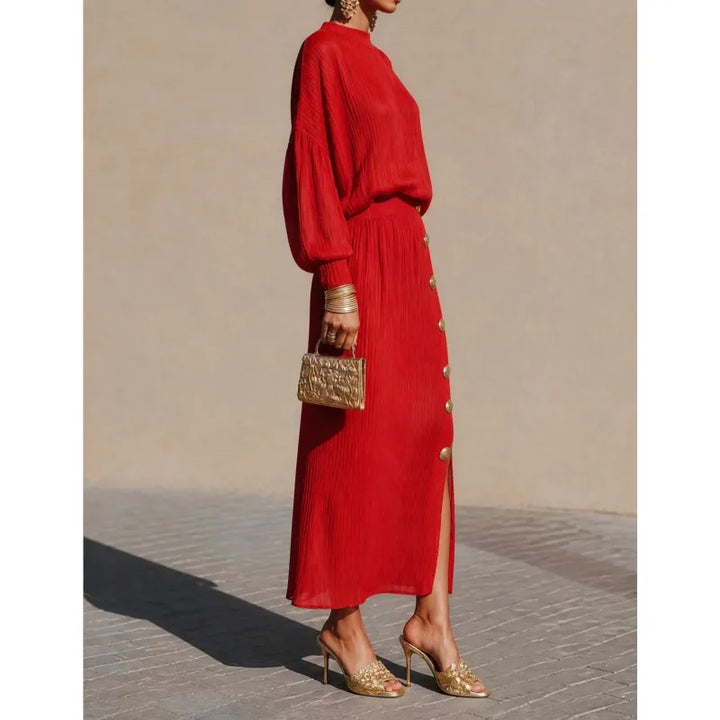 Red ribbed sweater dress with button side slit, side view