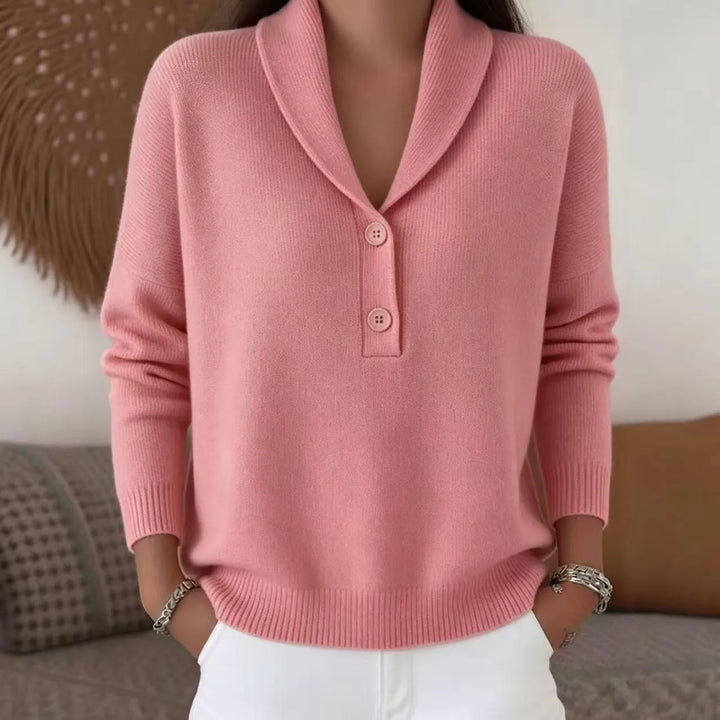 Woman wearing pink shawl collar button sweater