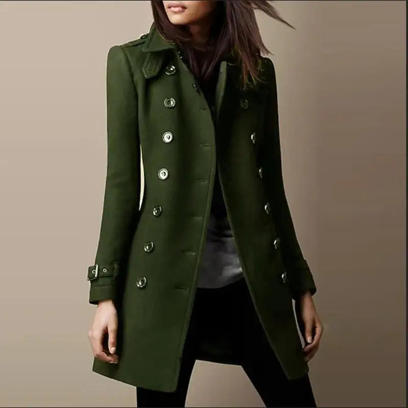 Woman wearing an army green double-breasted mid-length coat, front view