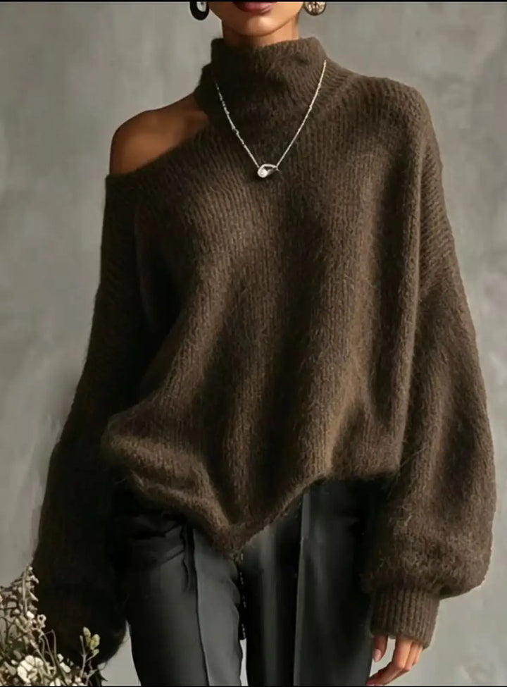 Woman wearing brown cutout shoulder turtleneck sweater