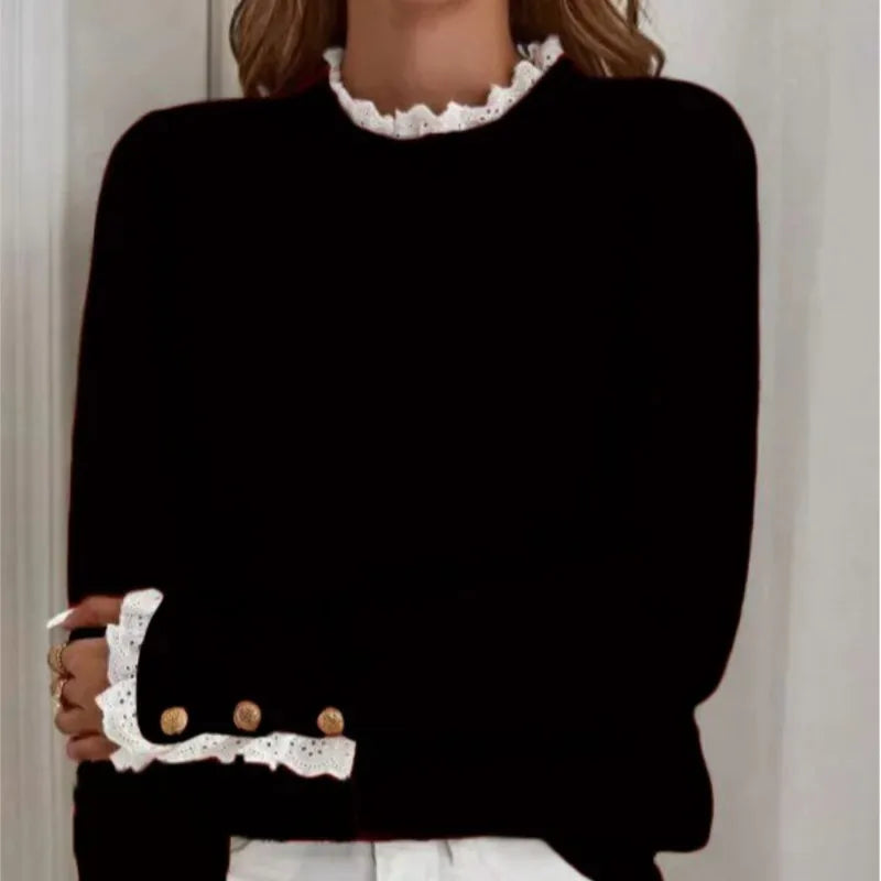 Close up of black sweater lace collar and cuff buttons