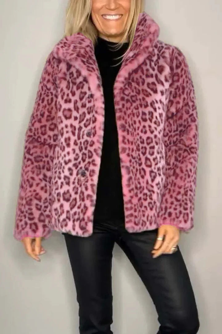 Model wearing pink leopard print faux fur coat, open front view