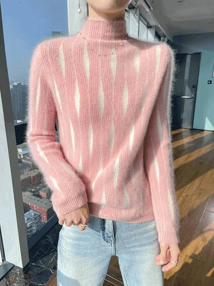 Pink striped mock neck sweater on model