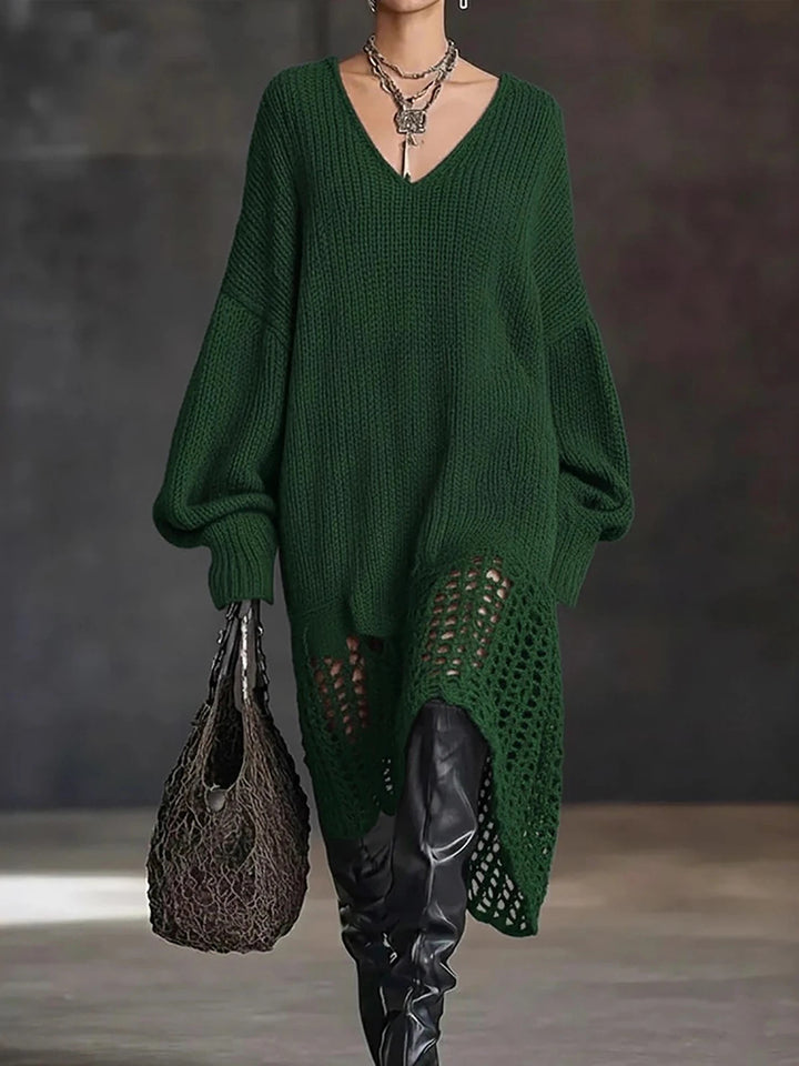 Model in green oversized crochet-hem sweater dress with over-the-knee boots