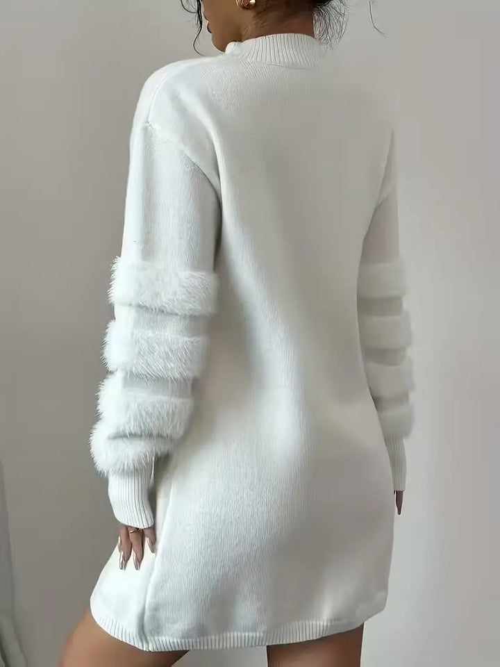 Back view of white knit sweater dress with textured sleeve panels
