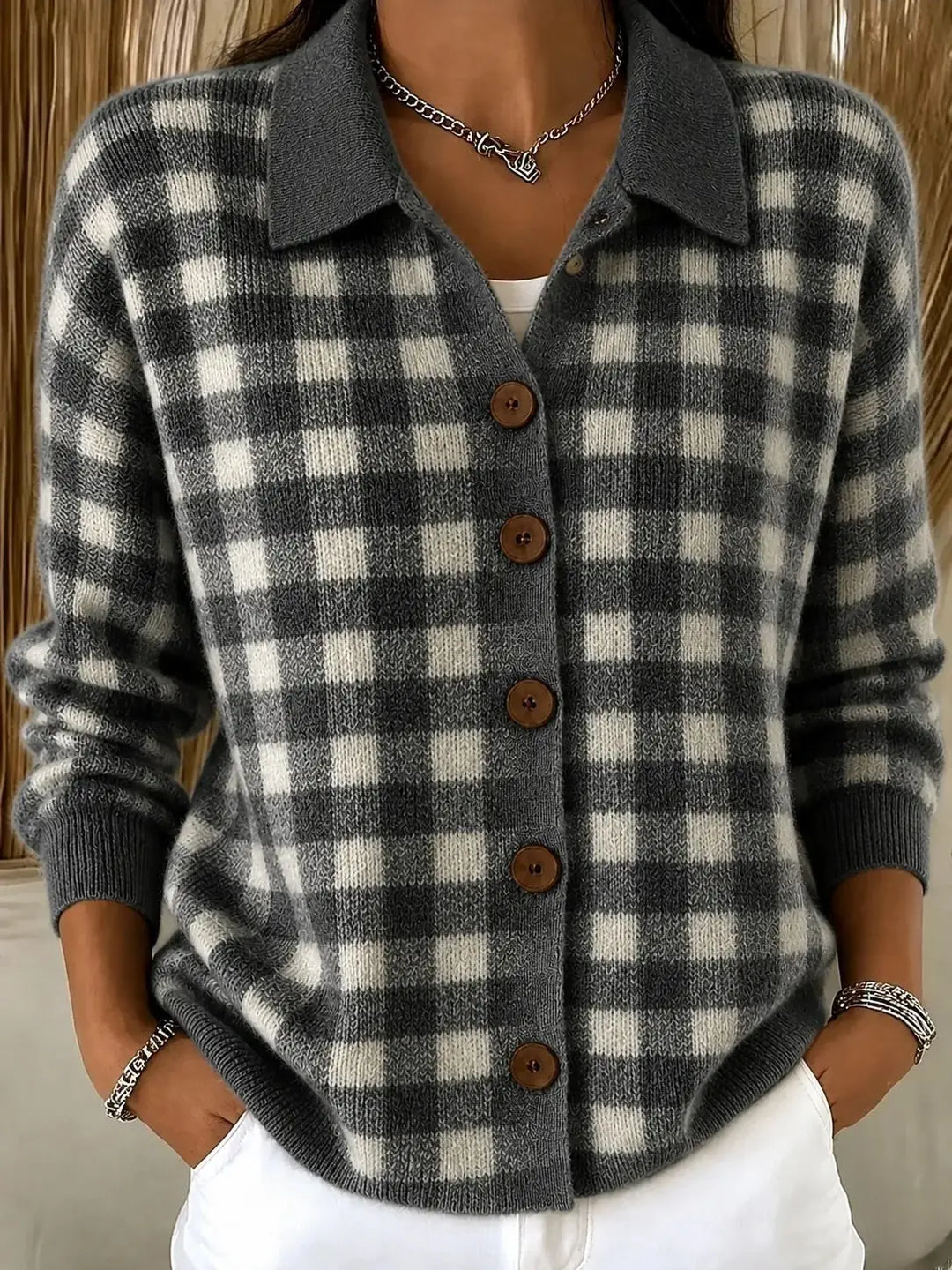 Woman wearing gray plaid knit button-front cardigan with point collar