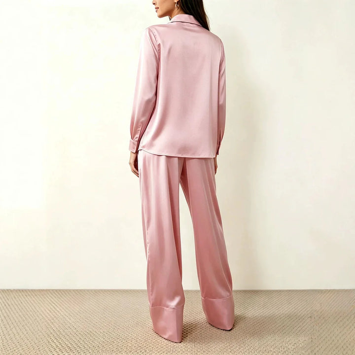 Back view of pink satin shirt and wide leg pant set