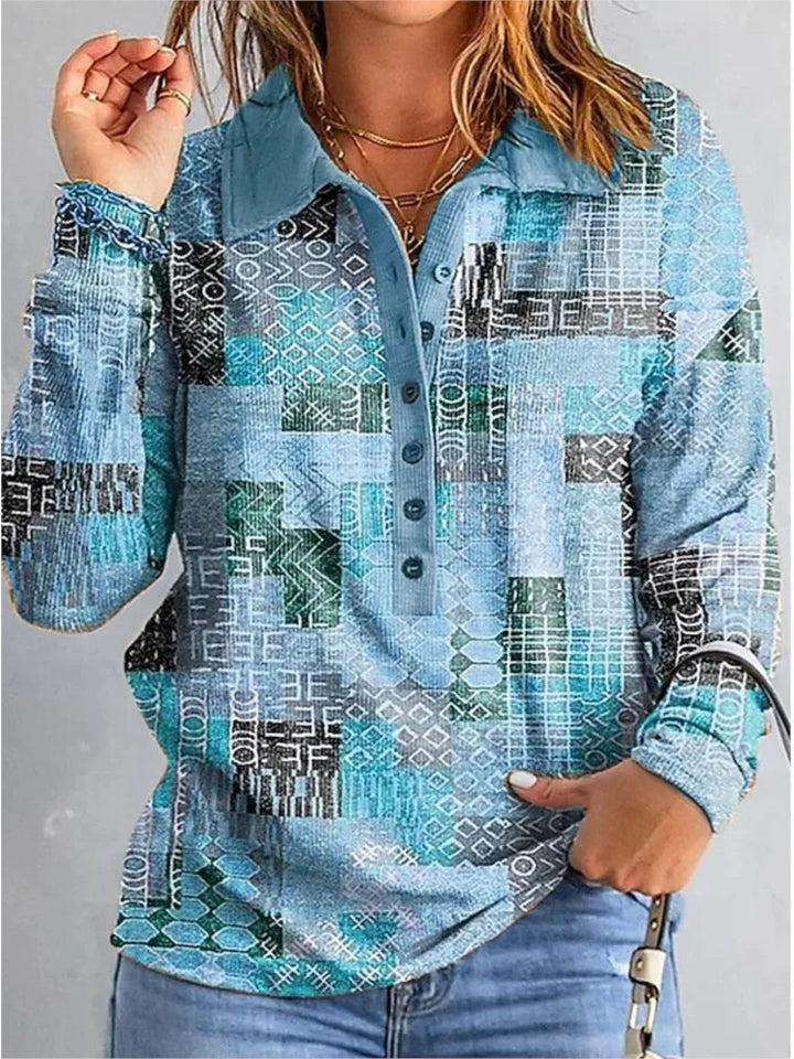 Woman wearing sky blue patchwork print button placket top