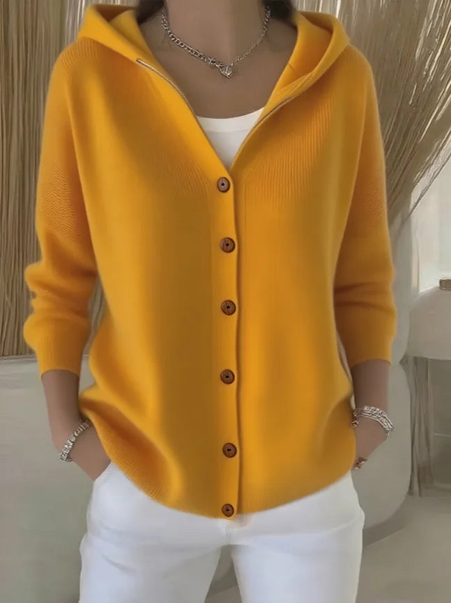 Yellow hooded button front knit cardigan, styled front view