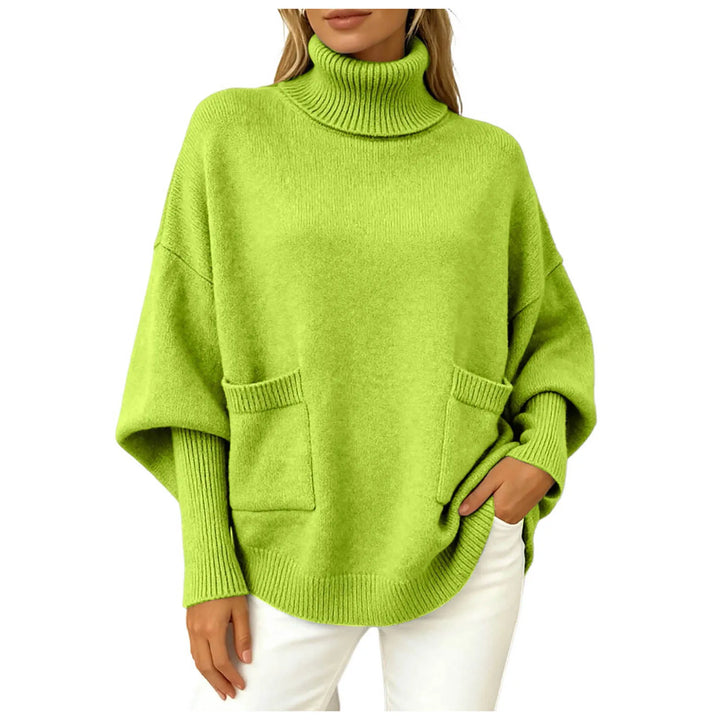 Woman wearing green oversized turtleneck sweater with front pockets