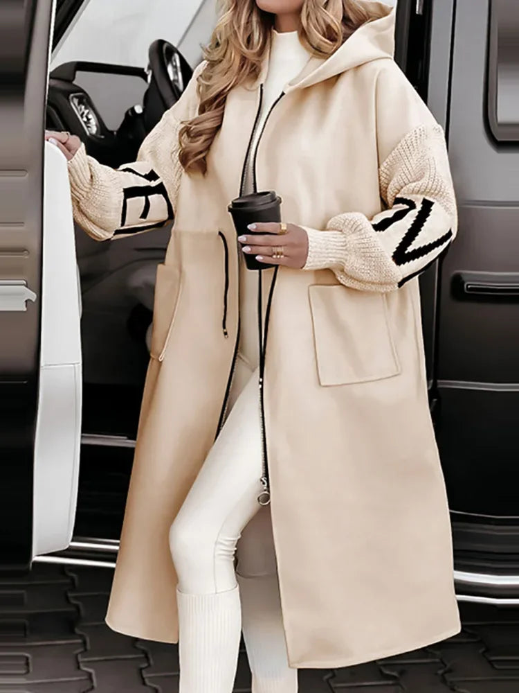Apricot hooded maxi coat with contrast knit sleeves and drawstring waist
