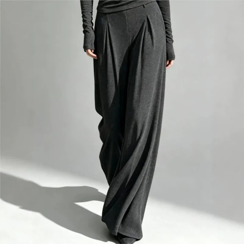 Back view of gray wide leg pleated pants