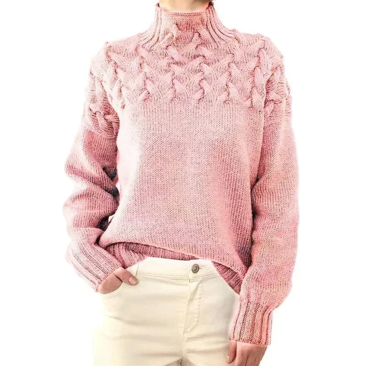Pink cable knit turtleneck sweater, front view