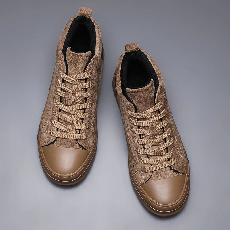 Top view of tan suede high-top sneaker pair