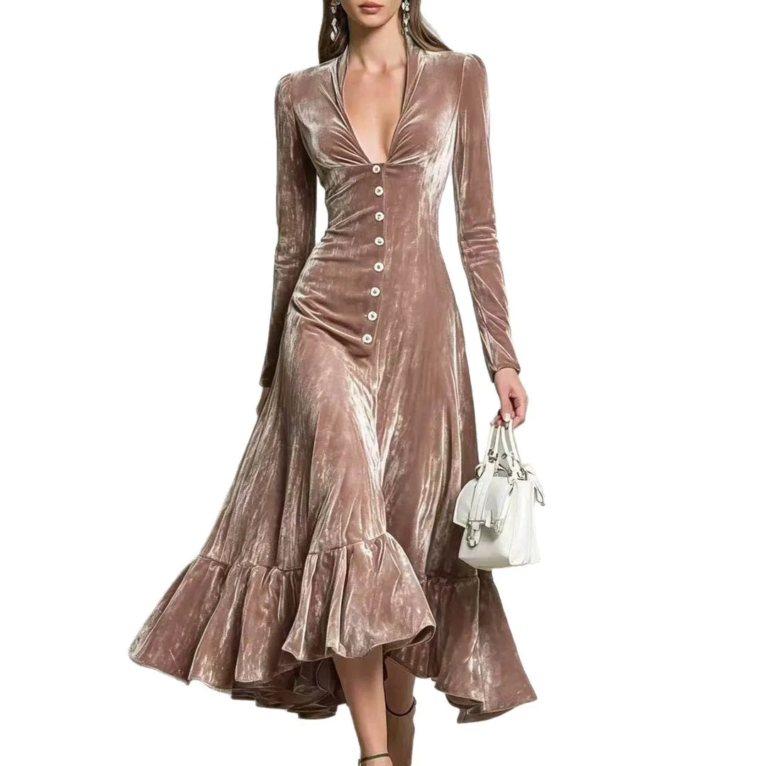 Woman in pink velvet midi dress on white background