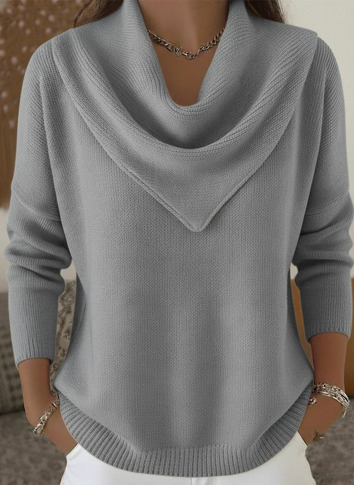 Woman wearing gray cowl neck ribbed knit sweater