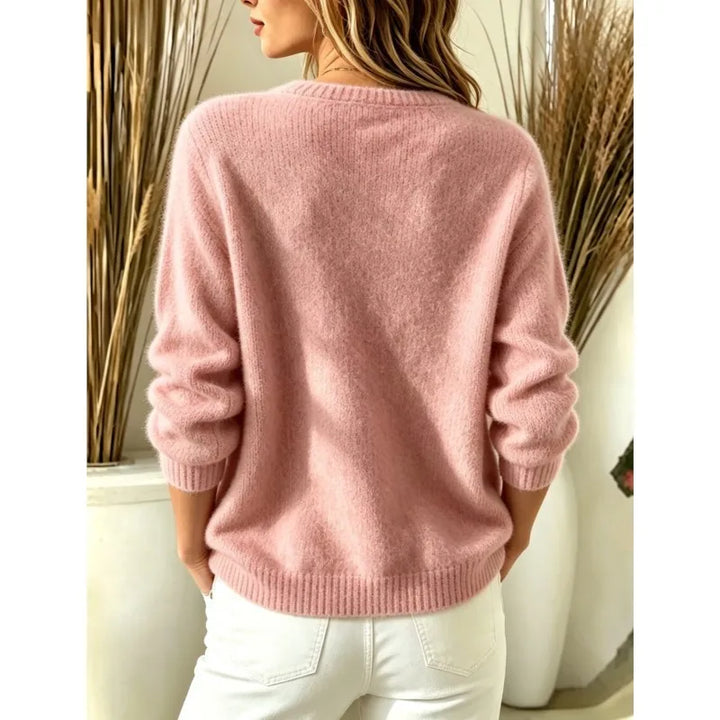 Back view of pink ribbed knit cardigan