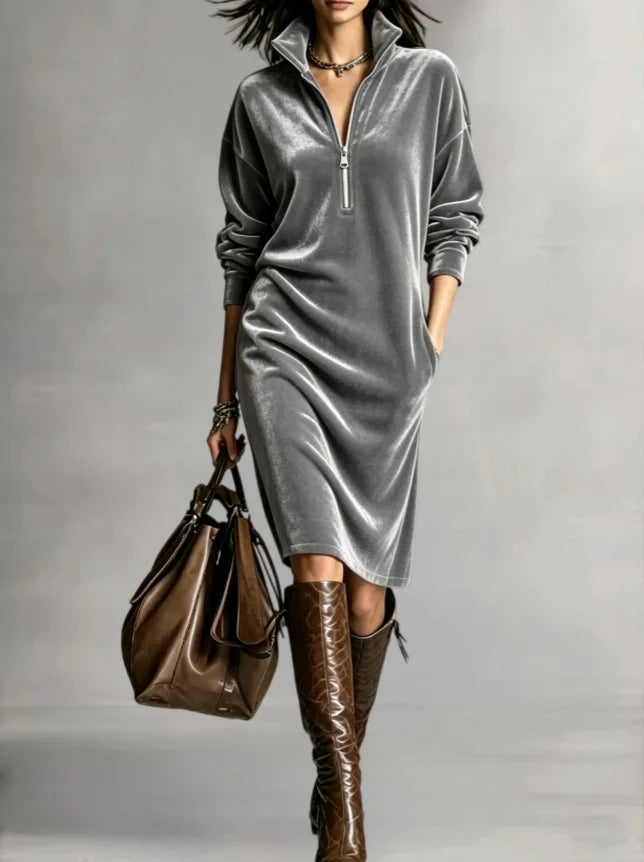 Woman in gray velvet half-zip midi dress