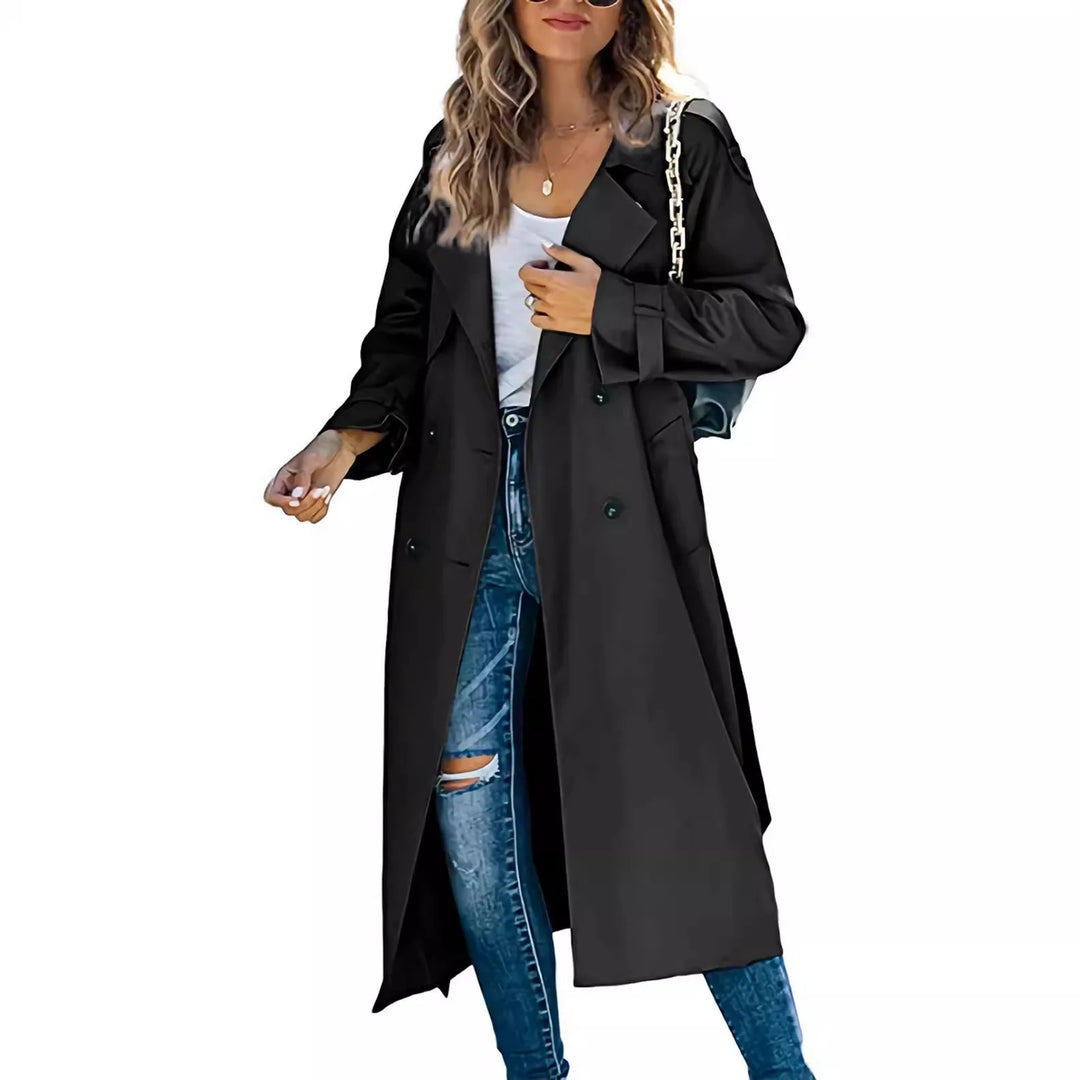 Woman wearing black oversized double breasted trench coat