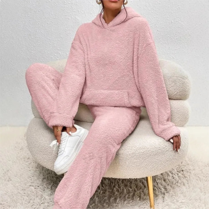 Woman wearing pink brushed fleece hooded loungewear set