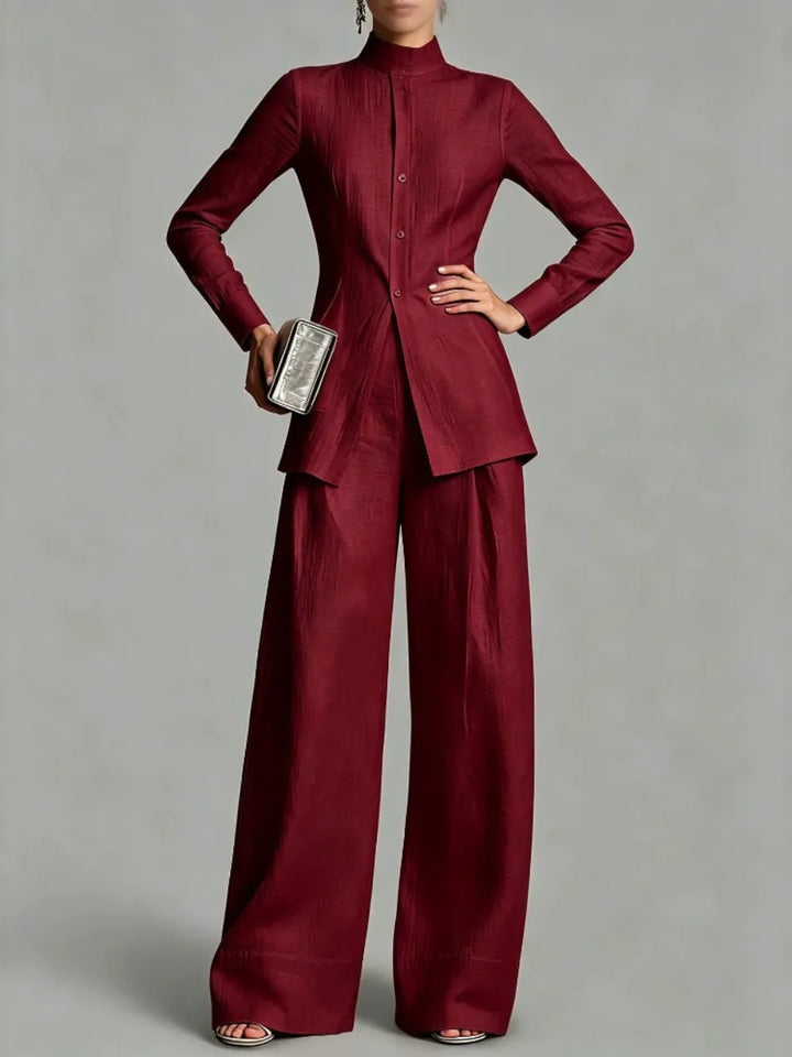 Woman wearing claret red mock neck top and wide leg pants set, front view
