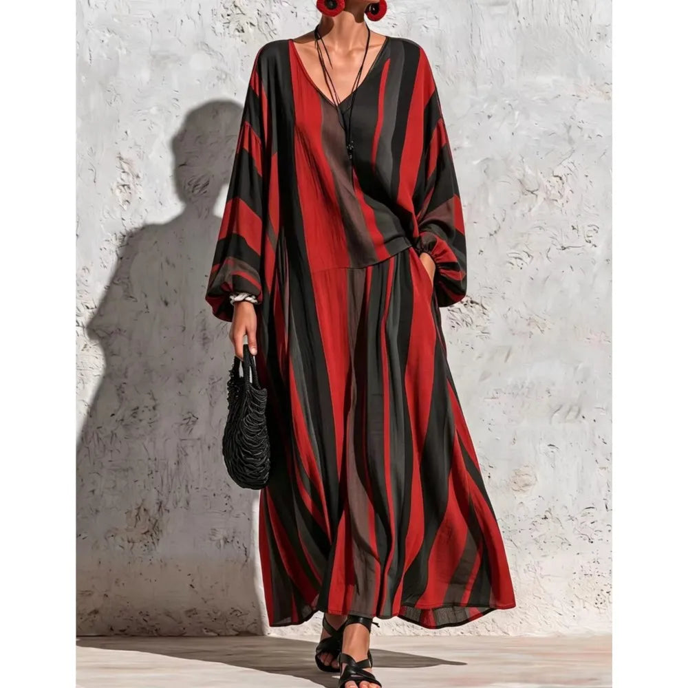 Woman wearing red and black striped V-neck top and wide leg pants set