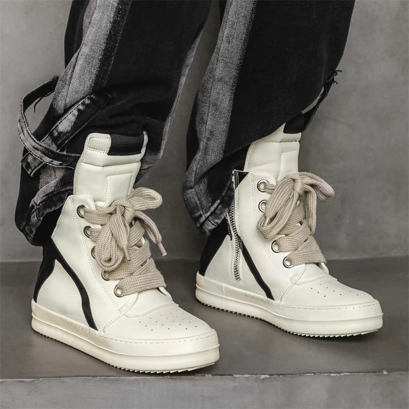 Beige high-top sneakers worn, side profile with zip