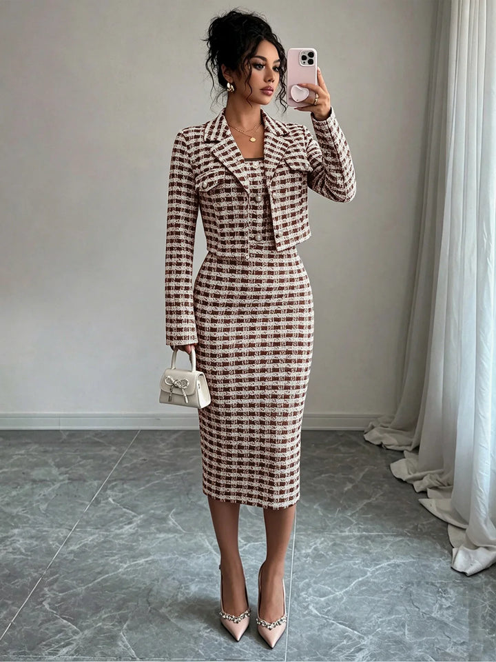 Woman in brown plaid cropped jacket and sheath dress set