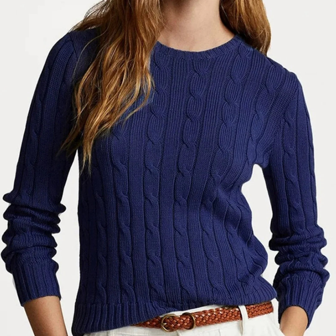 Navy blue cable knit crew neck sweater on model