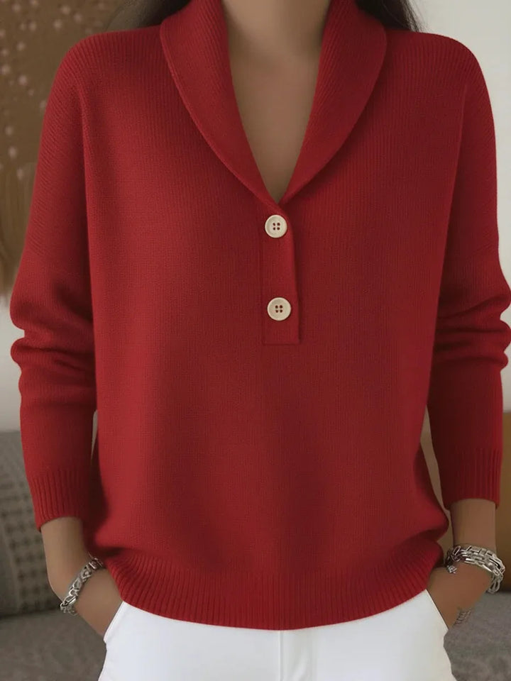 Woman wearing red shawl collar button sweater