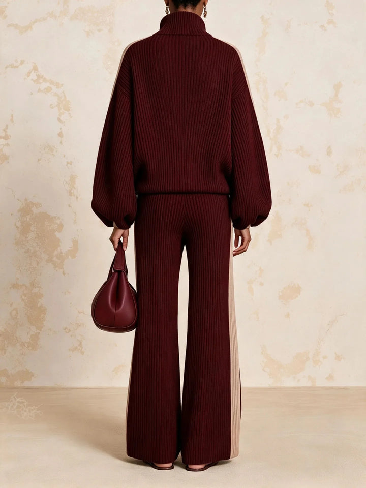 Back view of burgundy color block ribbed knit matching set showing wide leg pants and jacket