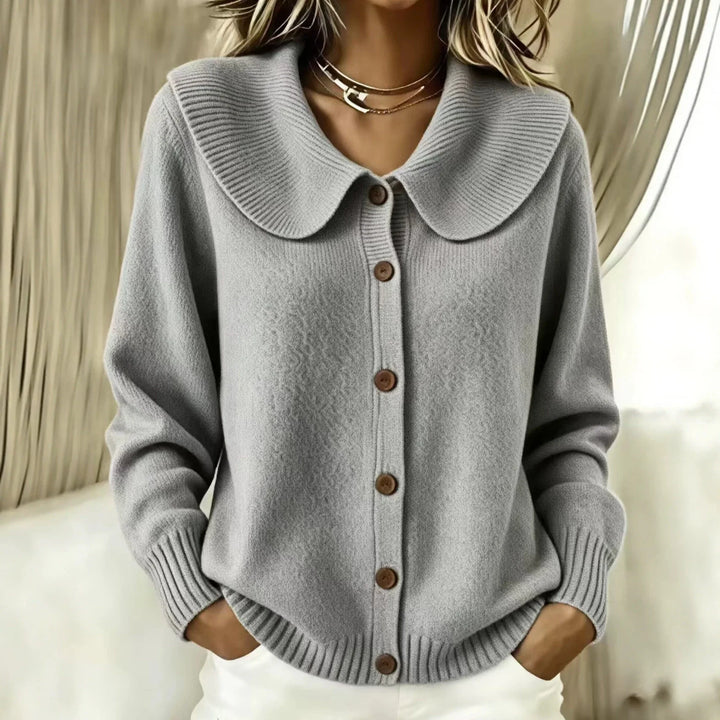 Woman wearing gray wide collar button front cardigan