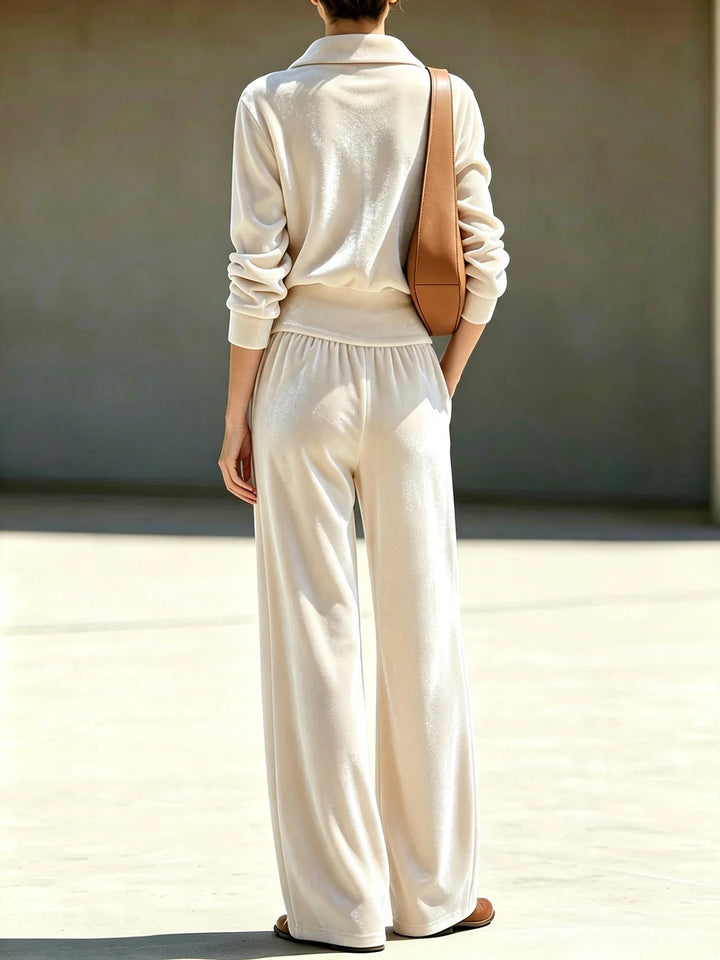 Back view of apricot velour half-zip top and wide leg pants set